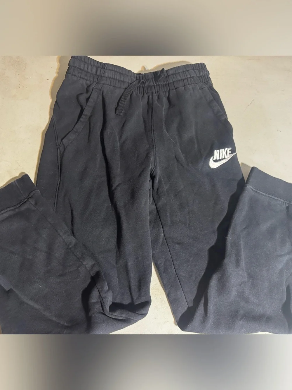 Nike Kids Black Sweatpants with White Swoosh